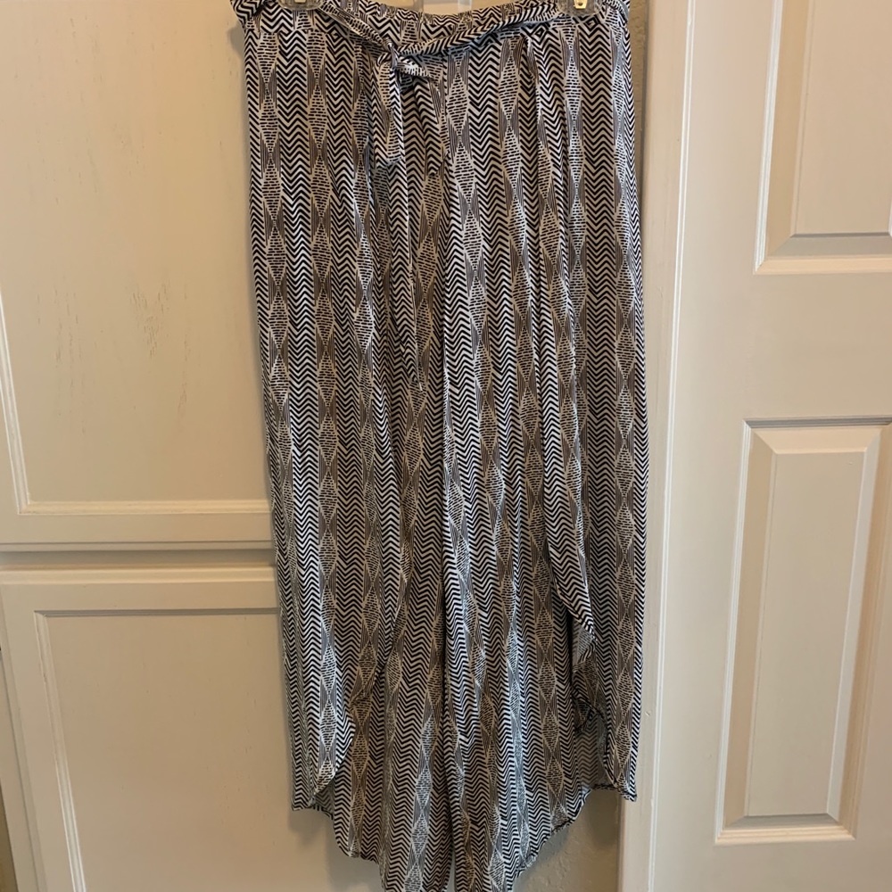Black & white “swimsuit” cover up pants.
